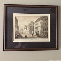 Full view of framed lithograph on wall