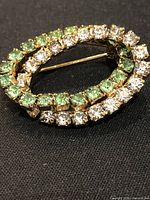 front view showing green and clear crystals