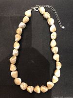 Full view of necklace showing nugget beads and clasp
