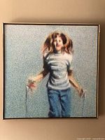 Front view of framed painting hung on wall