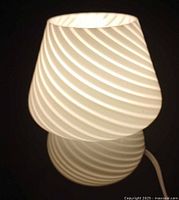 Lamp illuminated showing spiral pattern and glow