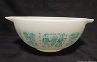 Side view of Pyrex Butterprint Cinderella bowl displaying pattern and shape