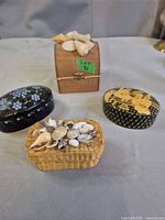 Four boxes closed showing variety of shapes and decorations