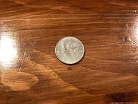 Reverse of 1968 Canadian dollar showing Voyageur canoe design and date