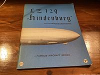 Front cover showing title, author Douglas H. Robinson, illustration of Hindenburg, Famous Aircraft Series branding