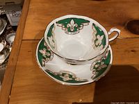 Teacup on saucer showing Boy Scouts design