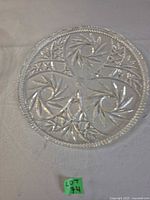 Front view of pressed crystal plate showing entire pattern