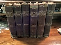 Front view of all six volumes showing titles and spine wear