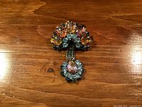 Front view showing stone colors and design