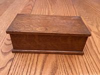 angled view of closed wooden box