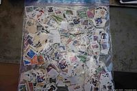 Entire sealed plastic bag filled with mixed U.S. stamps