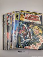 Stack of 11 bagged comic books, Time Machine #2 on top