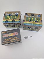 Front view of all three sealed O-Pee-Chee Premier hockey card boxes