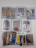 Front view of seven sleeved cards and stack of remaining cards