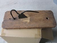 Full view of cutter showing wood base and iron lever