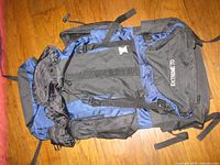 Front view of blue and black Sportex Extreme T10 backpack showing compartments and branding