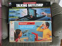 Both game boxes: Electronic Talking Battleship and Classic Battleship