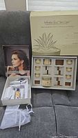 Full lot showing Infinite Aloe box open with jars and Meaningful Beauty box with assorted tubes