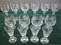 Group shot of all fourteen pinwheel crystal glasses