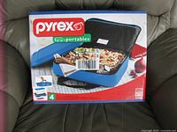 Front of sealed box showing product image and contents