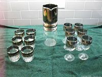 Full set showing pitcher, six tumblers, four goblets