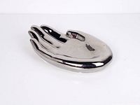 Chrome ceramic hand figurine overall top view
