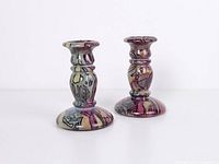 Front view pair painted glass candle holders
