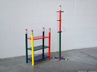 Full view of coat rack and shelf showing design and colours