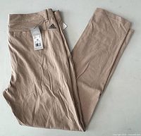 Full view of pants folded showing overall color and style