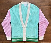 Front view showing button placket, pockets, color layout