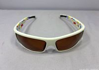 Front view of Bollé Tetra sunglasses showing lens tint and frame colour