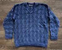 Front view of textured blue merino wool sweater
