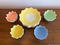 Full set of bowls and plates arranged by colour