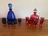 Both decanter sets front view