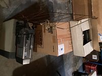 Overall lot showing camcorder, Infinity box, metal blanket rack