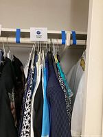 Overall view of garments hanging in closet