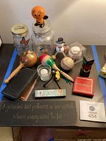 All items grouped on tabletop showing variety of lot contents