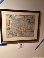 Full view of framed map on wall