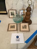 All six items arranged together on stone hearth