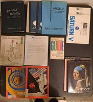 All items laid out showing covers and titles