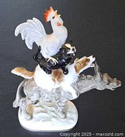 Front view of stacked animal porcelain figurine