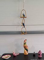 Group shot of all decorative items on table and hanging mobile