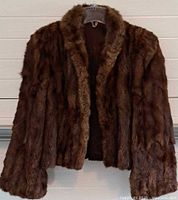 Front view of brown squirrel fur jacket