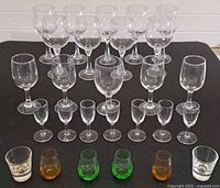 All glassware arranged in rows by size and type