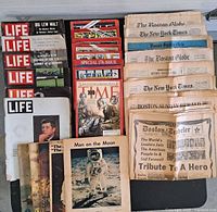 Assorted Life and Time magazines, newspaper stack right side