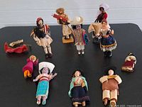 Group shot of all dolls laid out on table