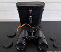 Binoculars, case and lens caps full lot overview