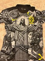 Front view of Brazil jersey showing Christ the Redeemer graphic, Nike swoosh, Brazil crest