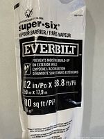 Close-up of Everbilt Super Six vapour barrier roll packaging showing dimensions and coverage