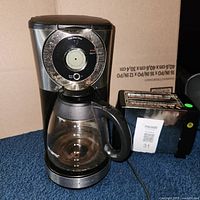 Coffee maker and toaster side by side